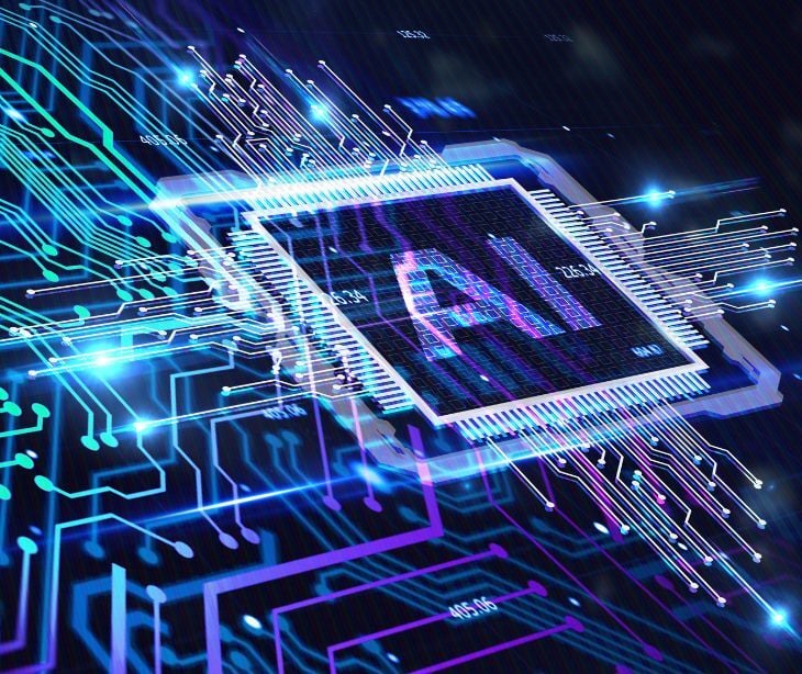 Image of what looks like a computer chip, with "AI" written inside. 