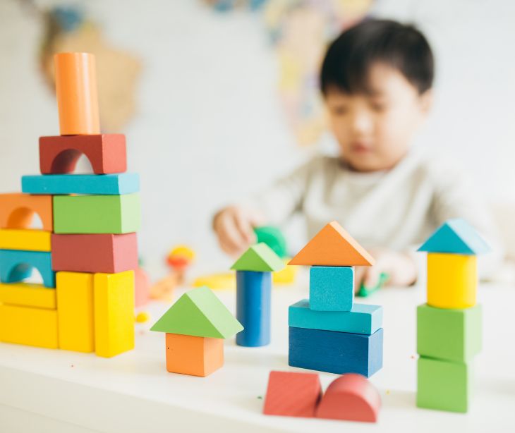 child playing with blocks