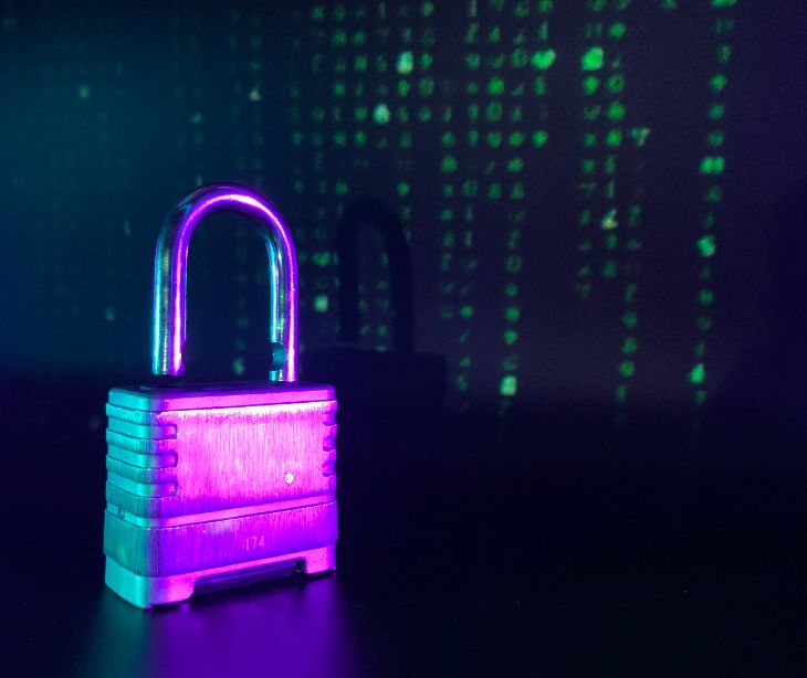 lock in front of a digital screen of code