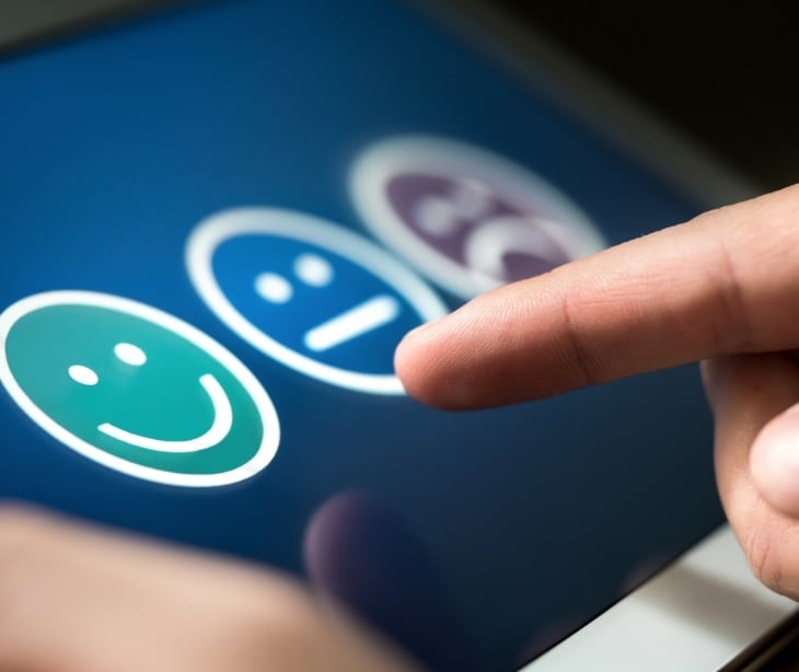 Image of a feedback form using facial expression icons. 