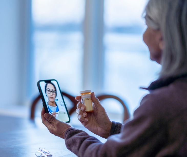 patient on smartphone video call with provider