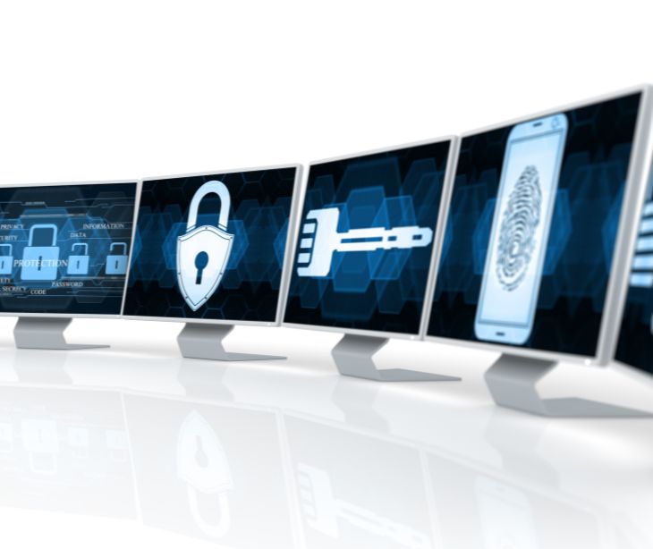 computer screens with various digital security logos