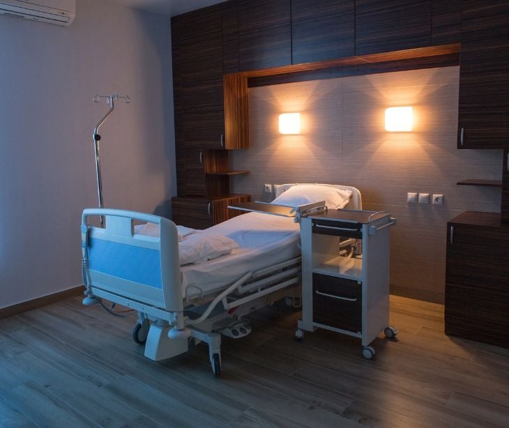 Image of a hospital room with bed. 