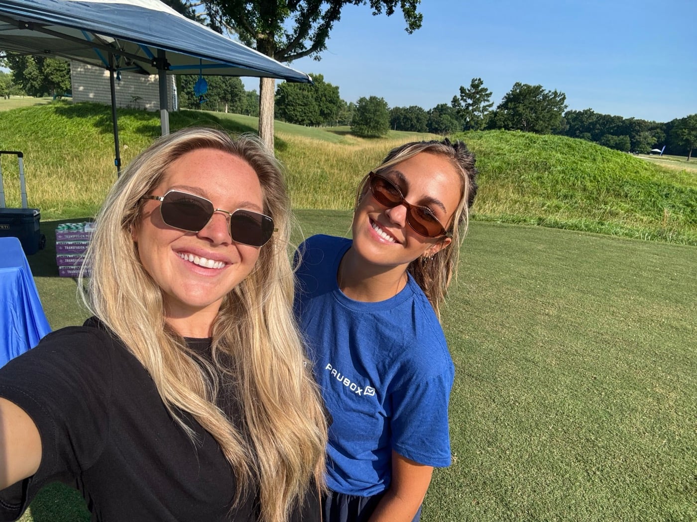Two Paubox team members at the sponsored hole.